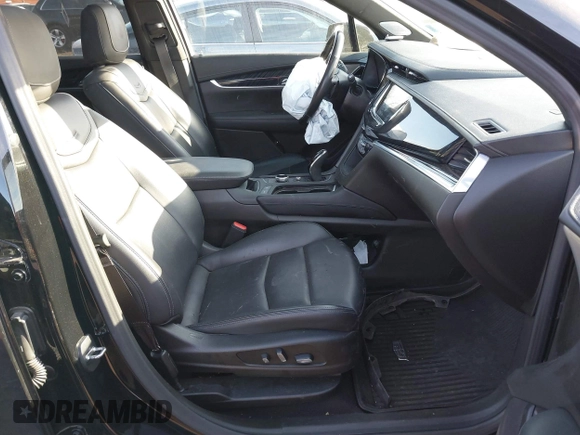 2023 Cadillac XT6 FWD Premium Luxury with VIN 1GYKPCRS1PZ105964, listed as a IAAI auction lot 41525039 with 70,603 mi miles and . Bid and sale history available at DreamBid. Image 5.