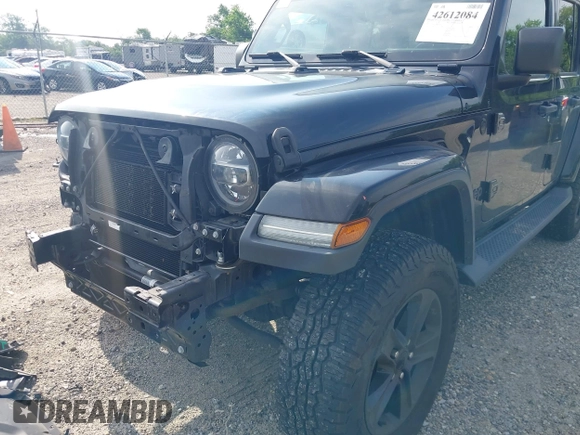 2020 Jeep Wrangler Unlimited Sahara High Altitude with VIN 1C4HJXEGXLW182581, listed as a IAAI auction lot 42612084 with 52,656 mi miles and . Bid and sale history available at DreamBid. Image 18.