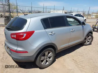 2012 Kia Sportage LX with VIN KNDPB3A27C7326884, listed as a IAAI auction lot 42010016 with 112,797 mi miles. Bid and sale history available at carsss.com. Image 4.