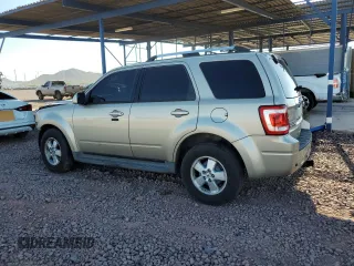2010 Ford Escape Limited with VIN 1FMCU9EG9AKB92211, listed as a Copart auction lot 64062905 with 180,721 mi miles and Salvage title. Bid and sale history available at DreamBid. Image 2.