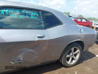 2013 Dodge Challenger SXT с VIN 2C3CDYAG7DH675121, выставлен на аукционе IAAI как лот 42623166 с пробегом 189 604 миль миль и . История ставок и продаж доступна на DreamBid. Изображение 22.