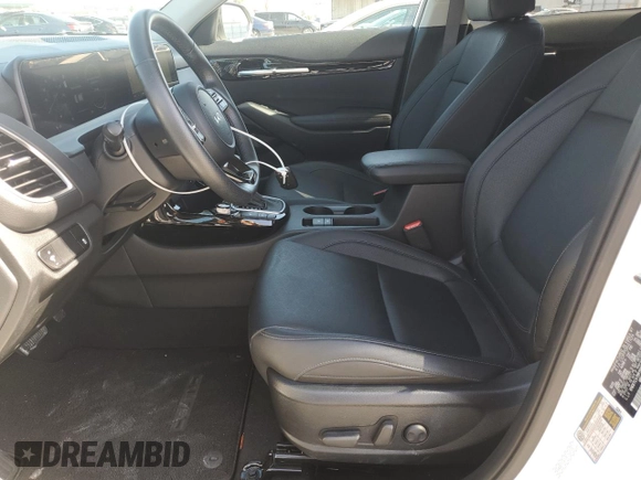 2024 Kia Seltos SX with VIN KNDETCA70R7600287, listed as a Copart auction lot 49093815 with 7,160 mi miles and Salvage title. Bid and sale history available at DreamBid. Image 7.