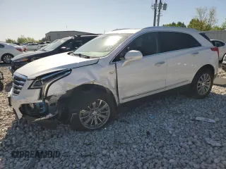 2017 Cadillac XT5 Luxury FWD z VIN 1GYKNBRS8HZ271027, wystawiony jako Copart lot #56403665 z przebiegiem 94 903 mil mil oraz Tytuł czysty. Historia ofert i sprzedaży dostępna na DreamBid. Obrazek 1.