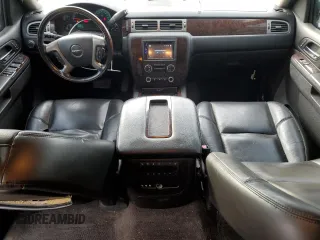2012 GMC Yukon Denali with VIN 1GKS1EEF1CR304040, listed as a Copart auction lot 42874135 with 182,879 mi miles and Salvage Title. Bid and sale history available at carsss.com. Image 8.