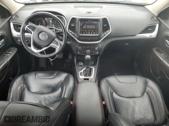 2016 Jeep Cherokee Trailhawk with VIN 1C4PJMBS8GW359461, listed as a Copart auction lot 57950705 with 146,124 mi miles and Salvage title. Bid and sale history available at DreamBid. Image 8.