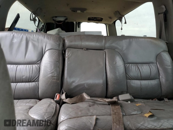 1999 Chevrolet Suburban with VIN 1GNEC16R7XJ418169, listed as a Copart auction lot 88995495 with 2,015,240 mi miles and Salvage title. Bid and sale history available at DreamBid. Image 10.