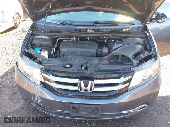 2014 Honda Odyssey Touring with VIN 5FNRL5H94EB081267, listed as a IAAI auction lot 41199509 with 146,827 mi miles and . Bid and sale history available at DreamBid. Image 10.