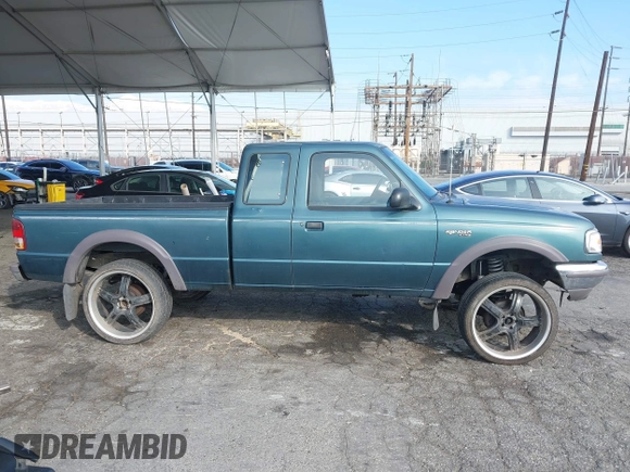 1997 Ford Ranger XLT with VIN 1FTDR15X5VPA65640, listed as a IAAI auction lot 41436818 with 212,661 mi miles. Bid and sale history available at carsss.com. Image 14.