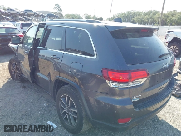 2020 Jeep Grand Cherokee Altitude with VIN 1C4RJFAG6LC325970, listed as a IAAI auction lot 42199817 with 51,259 mi miles and . Bid and sale history available at DreamBid. Image 3.