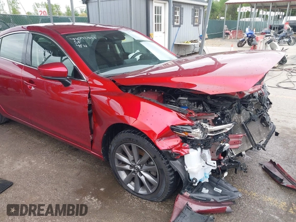 2020 Mazda 6 Sport with VIN JM1GL1UM9L1526019, listed as a IAAI auction lot 42092321 with 73,660 mi miles and . Bid and sale history available at DreamBid. Image 18.