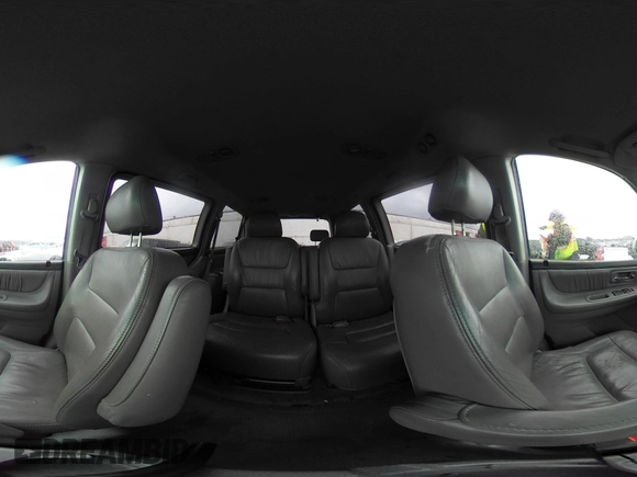 2004 Honda Odyssey EX-L with VIN 5FNRL18934B016420, listed as a IAAI auction lot 41473237 with 188,659 mi miles and . Bid and sale history available at DreamBid. Image 18.
