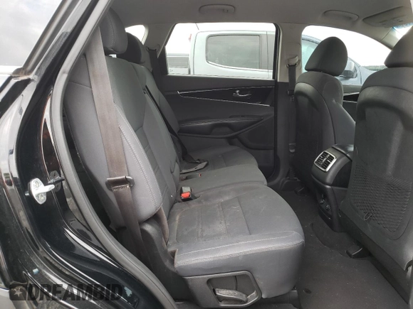 2019 Kia Sorento L z VIN 5XYPG4A34KG500069, wystawiony jako Copart lot #52714105 z przebiegiem 237 472 mil mil oraz Szkoda całkowita • Salvage title. Historia ofert i sprzedaży dostępna na DreamBid. Obrazek 11.
