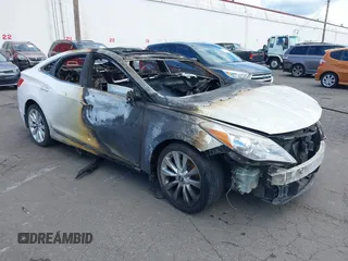 2014 Hyundai Azera Limited z VIN KMHFH4JG7EA354729, wystawiony jako IAAI lot #42083456 z przebiegiem Nie podano mil oraz . Historia ofert i sprzedaży dostępna na DreamBid. Obrazek 1.