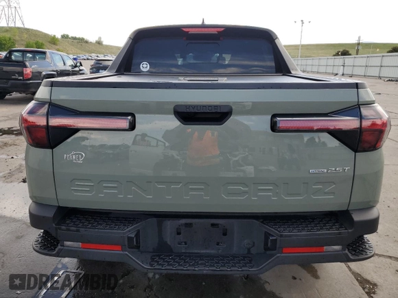 2022 Hyundai Santa Cruz SEL Premium z VIN 5NTJDDAF5NH016841, wystawiony jako Copart lot #58422695 z przebiegiem 27 287 mil mil oraz Szkoda całkowita • Salvage title. Historia ofert i sprzedaży dostępna na DreamBid. Obrazek 6.