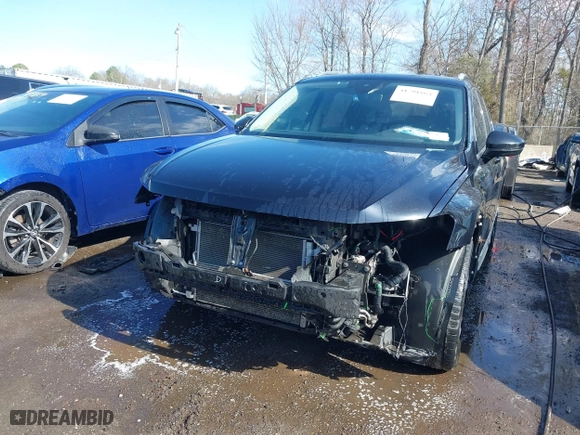 2020 Volkswagen Tiguan SE with VIN 3VV2B7AX5LM116837, listed as a IAAI auction lot 41791864 with 76,623 mi miles. Bid and sale history available at carsss.com. Image 6.
