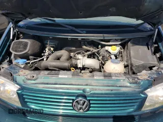 2003 Volkswagen EuroVan с VIN WV2KB47043H001319, выставлен на аукционе Copart как лот 73758024 с пробегом 88 497 миль миль и Чистый • Clean title. История ставок и продаж доступна на DreamBid. Изображение 12.