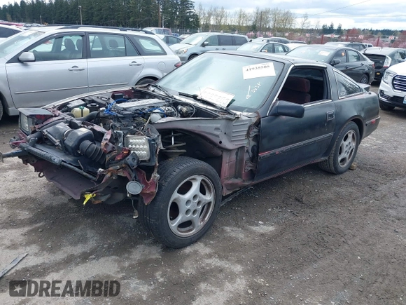 1986 Nissan 300ZX z VIN JN1HZ14S4GX140955, wystawiony jako IAAI lot #41935505 z przebiegiem 144 917 mil mil oraz . Historia ofert i sprzedaży dostępna na DreamBid. Obrazek 2.