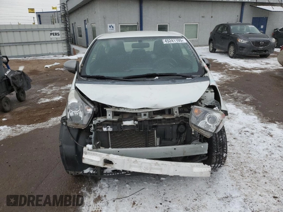 2014 Scion iQ with VIN JTNJJXB09EJ030330, listed as a Copart auction lot 45241105 with 46,879 mi miles and Salvage title. Bid and sale history available at DreamBid. Image 5.
