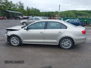 2014 Volkswagen Jetta TDI w/Premium/Nav with VIN 3VWLL7AJ9EM226026, listed as a IAAI auction lot 42219871 with 100,386 mi miles and . Bid and sale history available at DreamBid. Image 14.