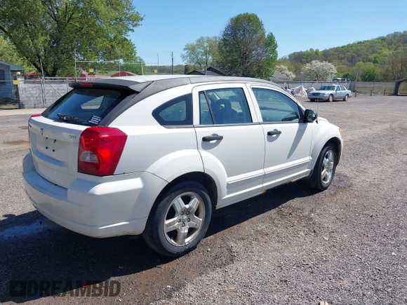 2007 Dodge Caliber SXT with VIN 1B3HB48BX7D160420, listed as a IAAI auction lot 42133771 with 169,796 mi miles and . Bid and sale history available at DreamBid. Image 4.