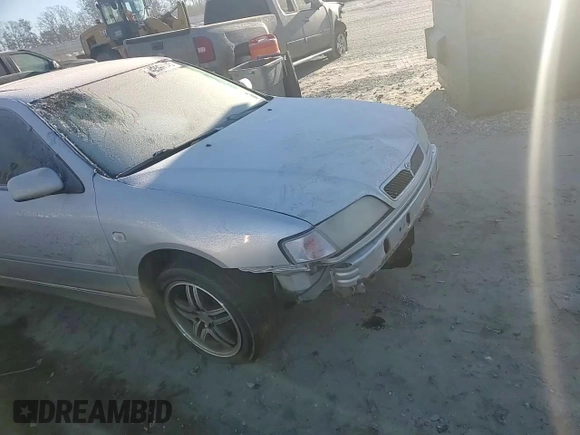 2002 Infiniti G20 Luxury with VIN JNKCP11A02T512055, listed as a Copart auction lot 42599045 with 160,649 mi miles and Salvage Title. Bid and sale history available at DreamBid. Image 11.