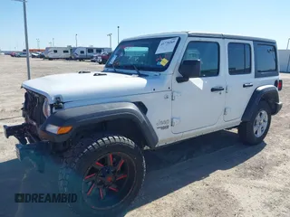 2021 Jeep Wrangler Unlimited Willys z VIN 1C4HJXDN3MW525460, wystawiony jako IAAI lot #41770265 z przebiegiem 76 480 mil mil oraz . Historia ofert i sprzedaży dostępna na DreamBid. Obrazek 2.