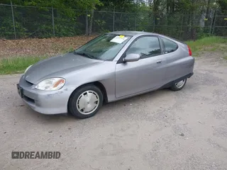 2000 Honda Insight with VIN JHMZE1370YT000399, listed as a IAAI auction lot 42337774 with 197,217 mi miles and . Bid and sale history available at DreamBid. Image 2.