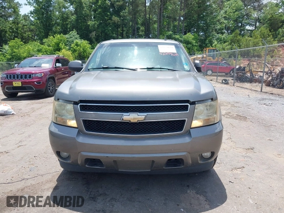 2007 Chevrolet Tahoe LT z VIN 1GNFC130X7R263516, wystawiony jako IAAI lot #42259629 z przebiegiem 215 970 mil mil oraz . Historia ofert i sprzedaży dostępna na DreamBid. Obrazek 6.
