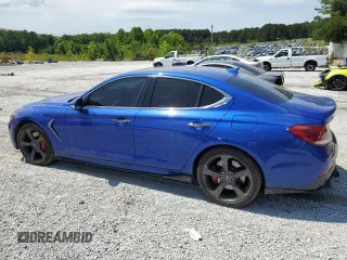 2020 Genesis G70 3.3T with VIN KMTG34LE7LU058061, listed as a Copart auction lot 57534815 with 76,885 mi miles and Salvage title. Bid and sale history available at DreamBid. Image 2.