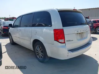 2015 Dodge Grand Caravan SE with VIN 2C4RDGBG9FR691462, listed as a IAAI auction lot 42197050 with 124,239 mi miles and . Bid and sale history available at DreamBid. Image 3.