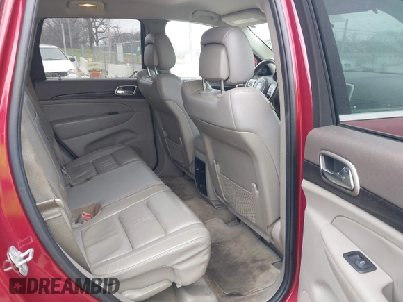 2013 Jeep Grand Cherokee Laredo with VIN 1C4RJEAG4DC573971, listed as a IAAI auction lot 41627288 with 143,256 mi miles. Bid and sale history available at carsss.com. Image 8.