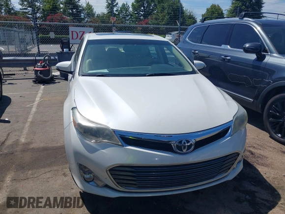 2014 Toyota Avalon Limited with VIN 4T1BK1EB0EU122498, listed as a IAAI auction lot 40248080 with 126,818 mi miles and . Bid and sale history available at DreamBid. Image 12.