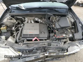 2000 Toyota Avalon XL with VIN 4T1BF28B4YU105732, listed as a Copart auction lot 54752665 with 143,855 mi miles and Salvage Title. Bid and sale history available at DreamBid. Image 11.