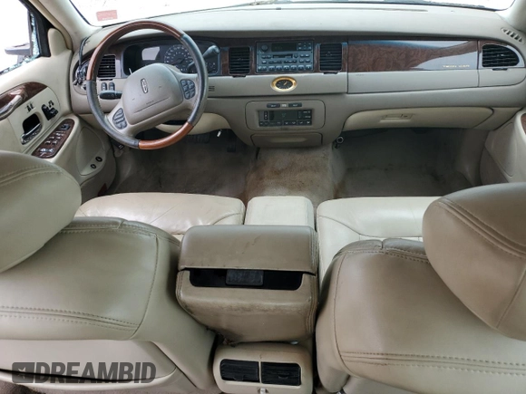 2001 Lincoln Town Car Cartier L z VIN 1LNHM85W61Y640344, wystawiony jako Copart lot #74755564 z przebiegiem Nie podano mil oraz Szkoda całkowita • Salvage title. Historia ofert i sprzedaży dostępna na DreamBid. Obrazek 8.