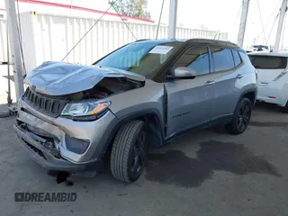 2019 Jeep Compass Latitude with VIN 3C4NJDBB4KT754484, listed as a IAAI auction lot 42324284 with 85,637 mi miles and . Bid and sale history available at DreamBid. Image 2.