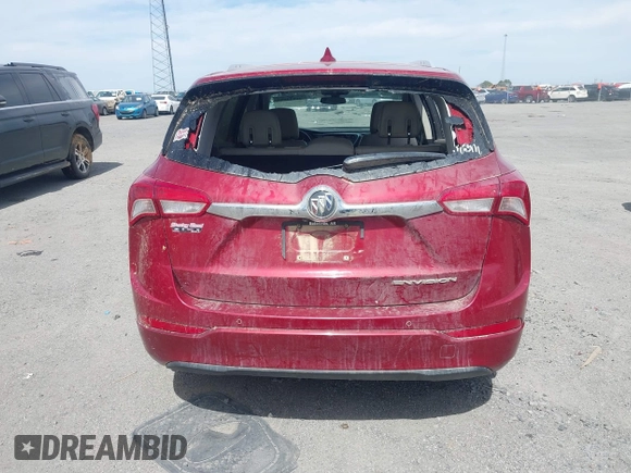 2020 Buick Envision Essence with VIN LRBFXCSA2LD019996, listed as a IAAI auction lot 41822093 with 112,829 mi miles and . Bid and sale history available at carsss.com. Image 16.