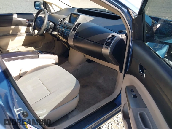 2005 Toyota Prius z VIN JTDKB20U150118440, wystawiony jako IAAI lot #42090135 z przebiegiem 263 095 mil mil oraz . Historia ofert i sprzedaży dostępna na DreamBid. Obrazek 5.
