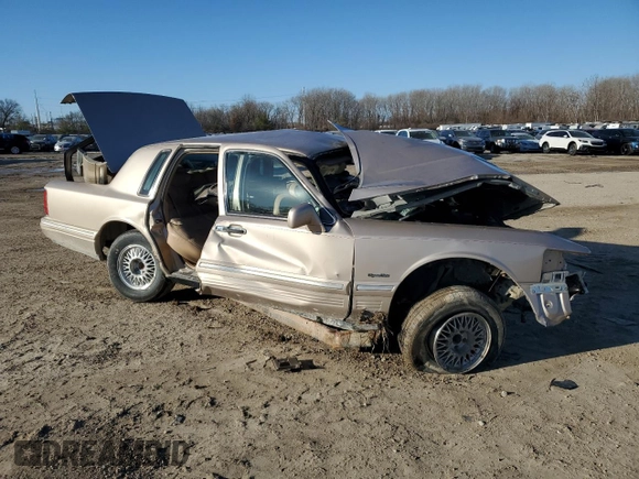 1997 Lincoln Town Car Signature z VIN 1LNLM82W5VY758132, wystawiony jako Copart lot #42643405 z przebiegiem Nie podano mil oraz Szkoda całkowita • Salvage title. Historia ofert i sprzedaży dostępna na DreamBid. Obrazek 4.