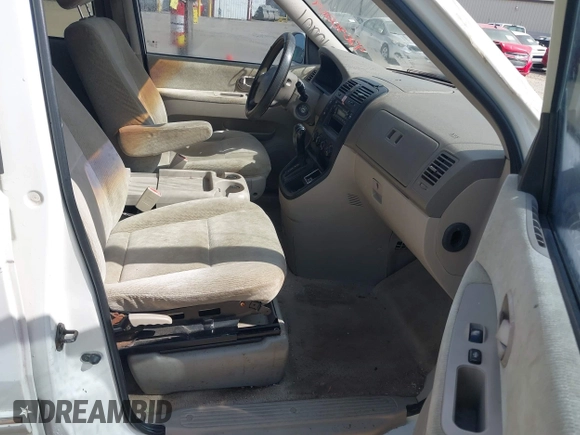 2005 Kia Sedona LX with VIN KNDUP131456634276, listed as a IAAI auction lot 42090209 with 185,754 mi miles and . Bid and sale history available at DreamBid. Image 5.