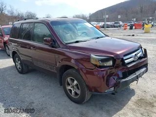 2007 Honda Pilot EX-L with VIN 5FNYF18587B021312, listed as a IAAI auction lot 41801006 with 261,842 mi miles. Bid and sale history available at carsss.com. Image 1.