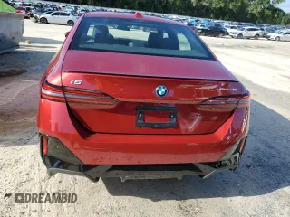 2024 BMW i5 eDrive40 with VIN WBY33FK01RCR76500, listed as a Copart auction lot 65026585 with 3,601 mi miles and Salvage title. Bid and sale history available at DreamBid. Image 6.