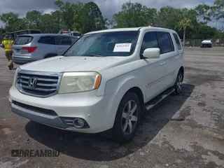 2012 Honda Pilot Touring with VIN 5FNYF3H9XCB035494, listed as a IAAI auction lot 42011362 with 271,887 mi miles and . Bid and sale history available at carsss.com. Image 12.