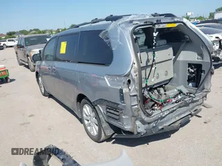 2012 Toyota Sienna XLE AAS with VIN 5TDYK3DC7CS185555, listed as a IAAI auction lot 42013098 with 140,969 mi miles. Bid and sale history available at carsss.com. Image 3.
