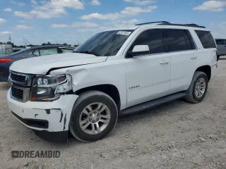 2015 Chevrolet Tahoe LS with VIN 1GNSCAEC2FR740167, listed as a Copart auction lot 52977455 with 197,265 mi miles and Salvage title. Bid and sale history available at DreamBid. Image 1.