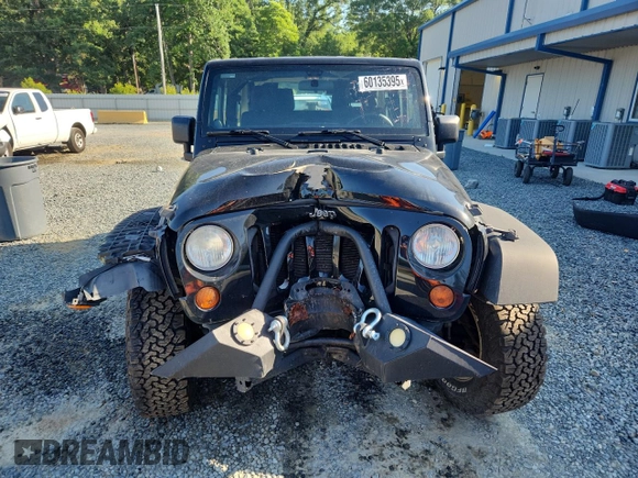 2012 Jeep Wrangler Sport with VIN 1C4AJWAG5CL273292, listed as a Copart auction lot 60135395 with 123,874 mi miles and Salvage title. Bid and sale history available at DreamBid. Image 5.