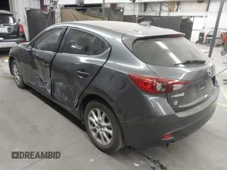 2015 Mazda 3 i Touring with VIN JM1BM1L75F1259985, listed as a IAAI auction lot 41067447 with 104,865 mi miles and . Bid and sale history available at carsss.com. Image 3.