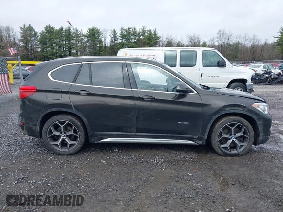 2018 BMW X1 xDrive28i with VIN WBXHT3C34J5K31430, listed as a IAAI auction lot 41954792 with 125,447 mi miles. Bid and sale history available at carsss.com. Image 13.