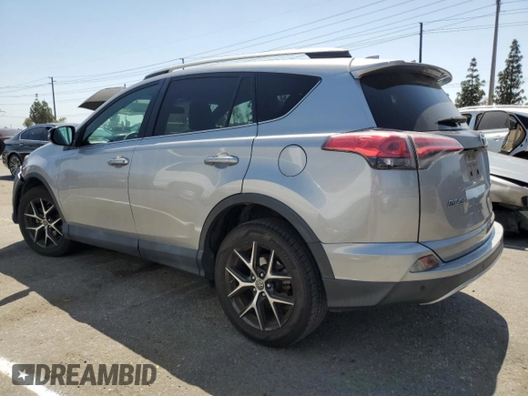 2016 Toyota RAV4 SE z VIN 2T3JFREV5GW499752, wystawiony jako Copart lot #62032045 z przebiegiem 77 711 mil mil oraz Szkoda całkowita • Salvage title. Historia ofert i sprzedaży dostępna na DreamBid. Obrazek 2.