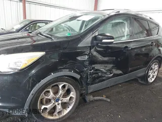 2015 Ford Escape Titanium with VIN 1FMCU9J98FUB00525, listed as a IAAI auction lot 42547989 with 194,040 mi miles and . Bid and sale history available at DreamBid. Image 6.