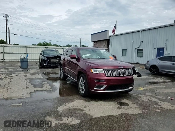 2019 Jeep Grand Cherokee Summit with VIN 1C4RJEJGXKC716175, listed as a Copart auction lot 58656005 with 68,431 mi miles and Salvage title. Bid and sale history available at DreamBid. Image 14.